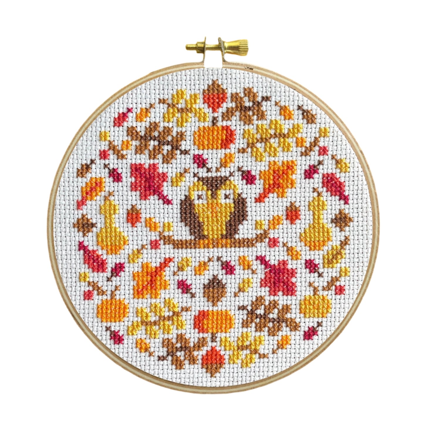 Autumnal Cross Stitch Kit available at KangyCo.com. You could see an owl in the middle and acorns, pumpkins, leaves, and more autumnal items.