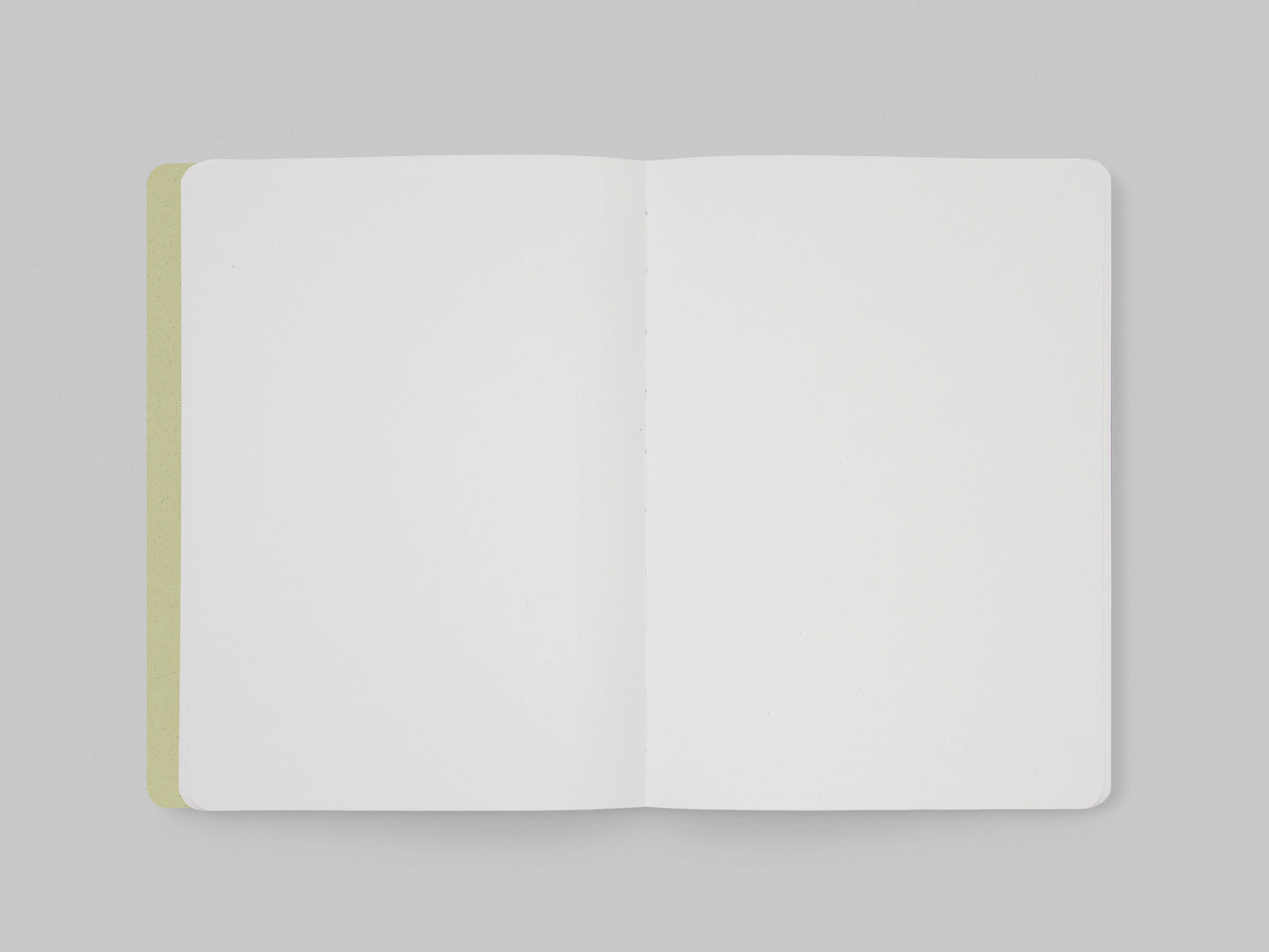 Image shows the blank FA VO notebook in Kiwi. The notebook lays flat which is shown in the image.