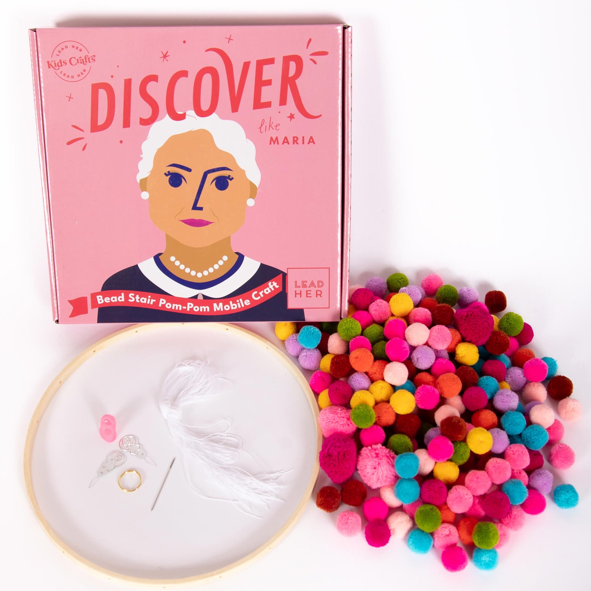 The supplies inside Kids Crafts "Discover Like Maria" Bead Stair Pom-Pom Mobile Craft kit with supplies.