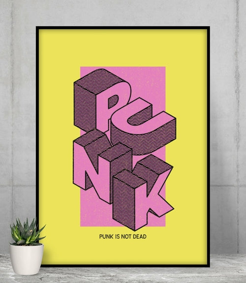 Punk Is Not Dead poster is framed leaning against a wall.