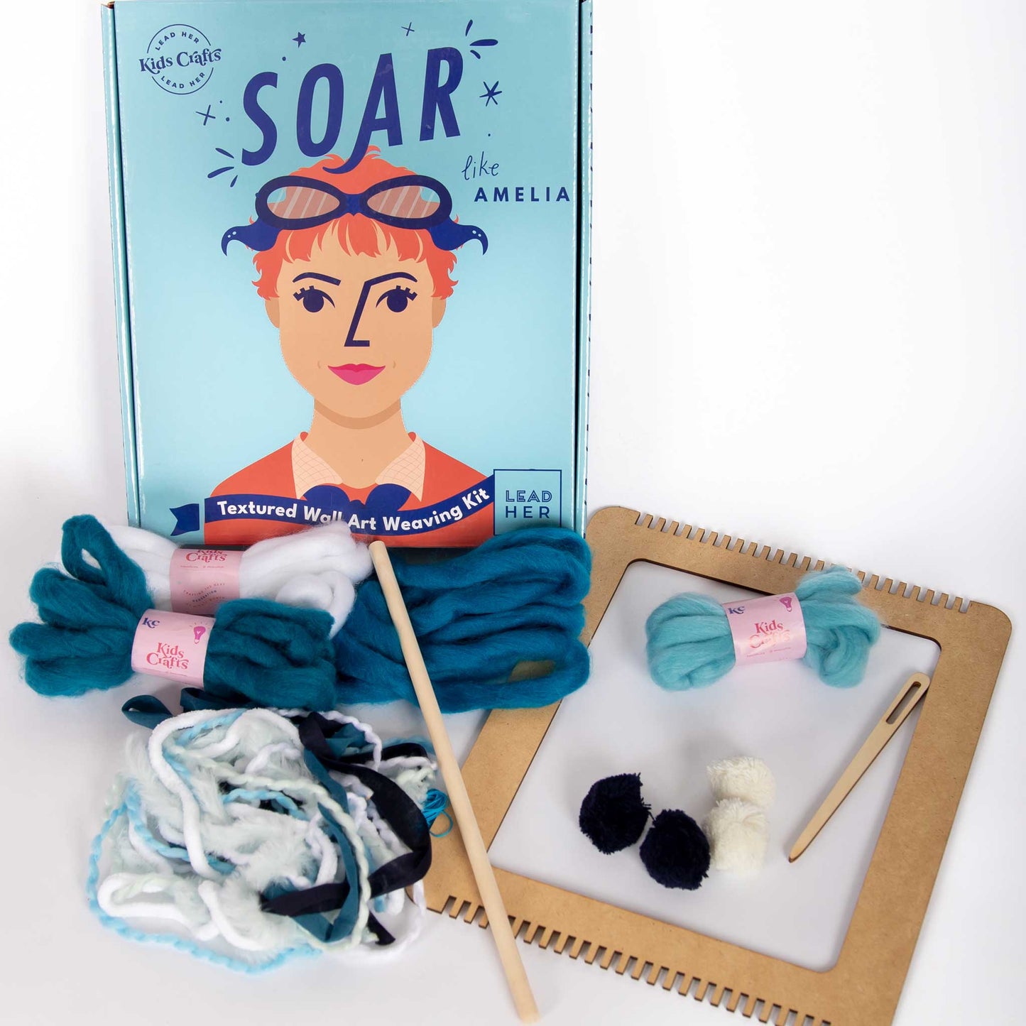 A zoomed in image of the Soar Like Amelia with the weaving kit supplies displayed in front of the box.