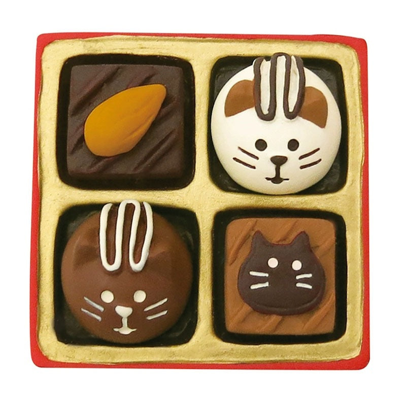 This is a cute Pawsome figurine that comes as a chocolate box made from Polymer Clay and 4 different Pawsome Chocolates. (Not Edible).