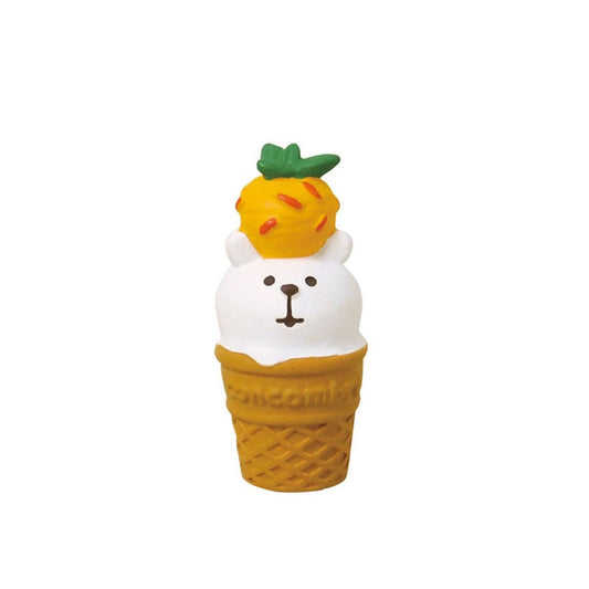 A Pawsome Polymer Clay figurine of a polar bear character as a vanilla ice cream scoop and a yellow fruit on its head, in an ice cream cone.