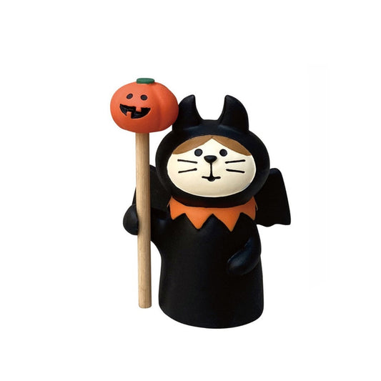 A Pawsome Figurine that is ready for Halloween. The Pawsome is wearing a costume of a bat and has a stick with a pumpkin head on the top. 