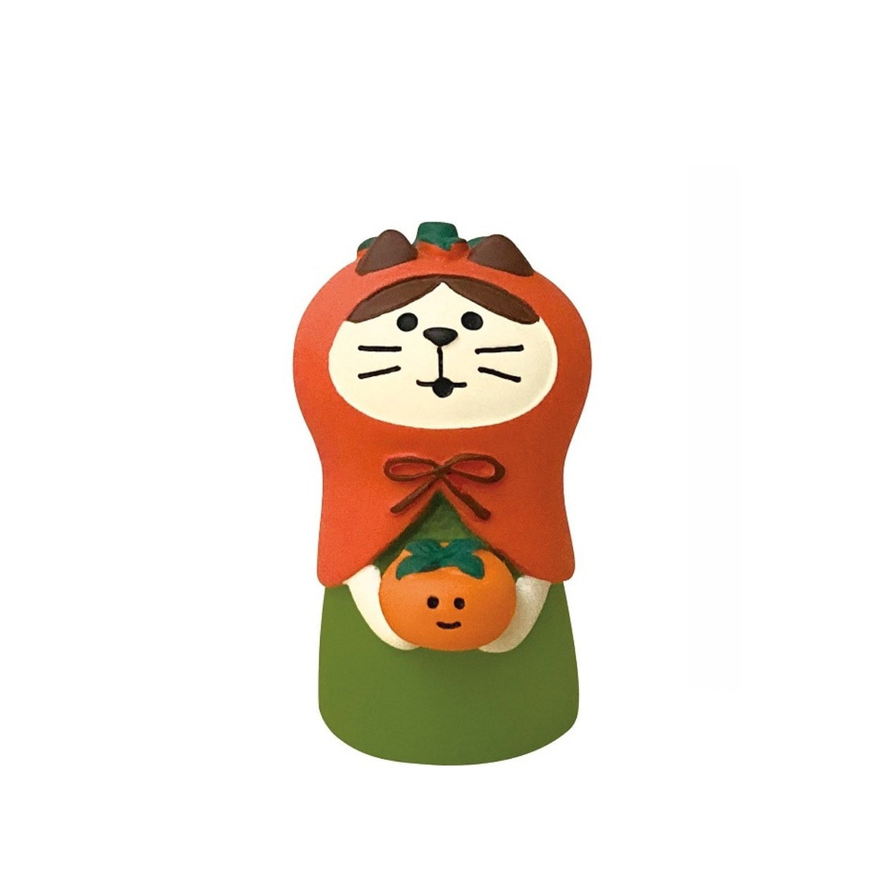 Pawsome figurine ready for halloween wearing a pumpkin costume and holding a pumpkin with both hands.