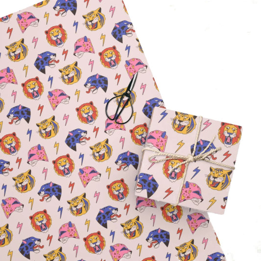 The Pretty Roaring Animals Gift wrapping paper, next to a gift wrapped in the paper. 