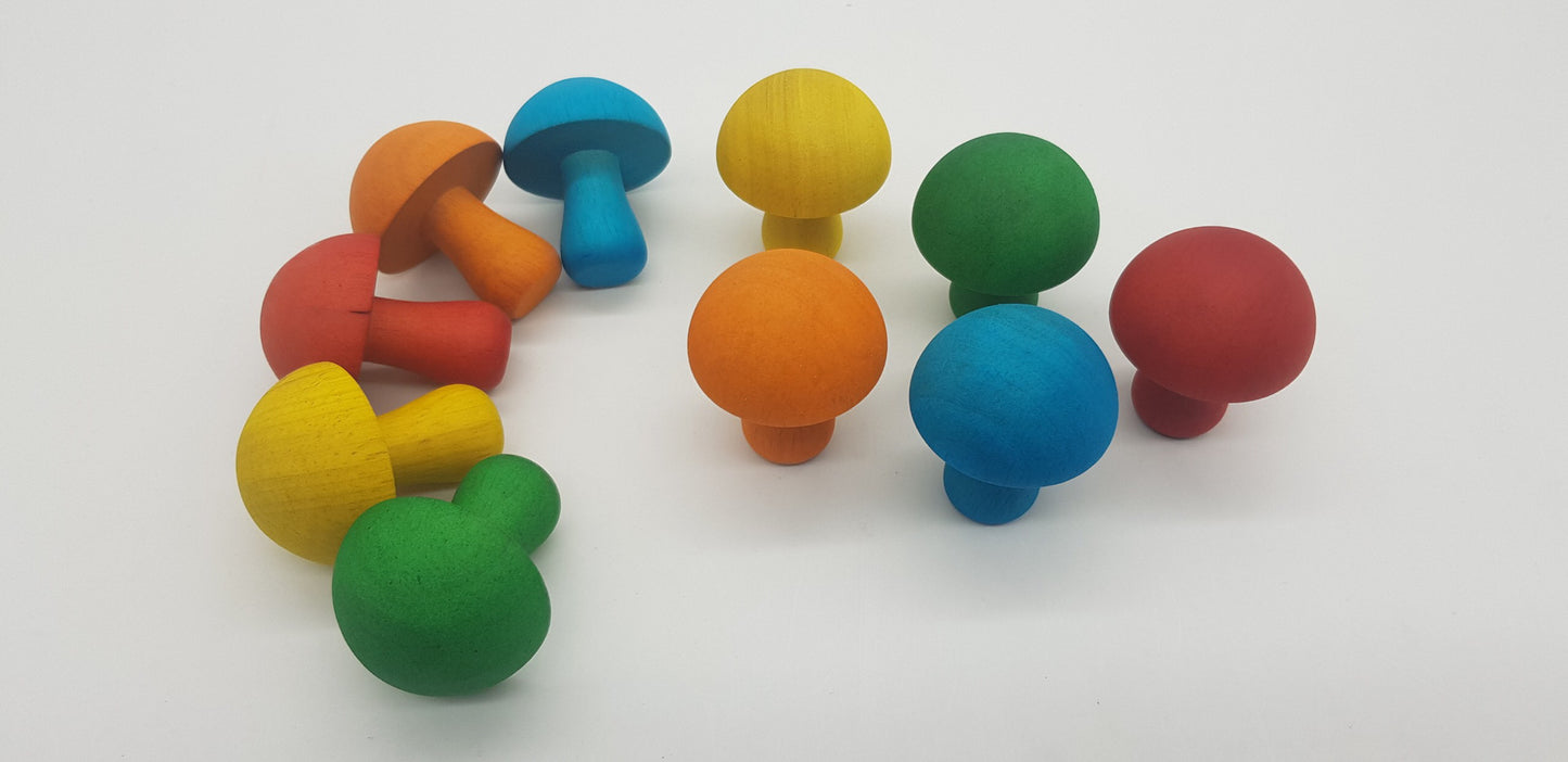 A set of 10 colorful mushroom for open-ended play. Two mushrooms per color, the colors are: red, orange, yellow, green, and blue.